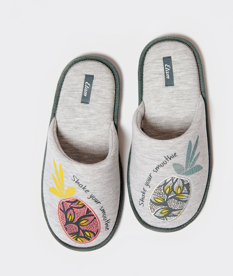 Slippers in a pineapple 'shake your smoothie' print grey.