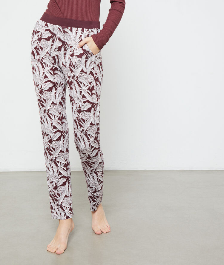 Foliage print trousers brown.