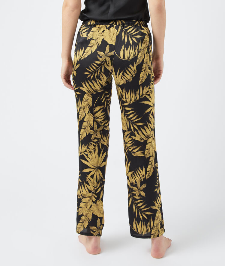 Trousers in a foliage print black.