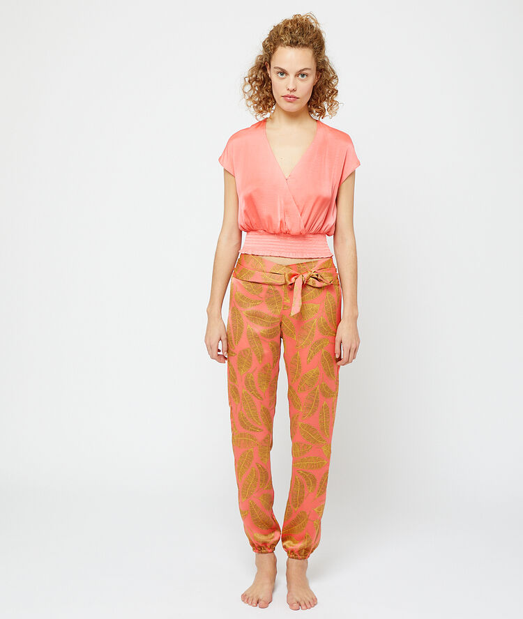Satiny crop top with smocked waist pink.