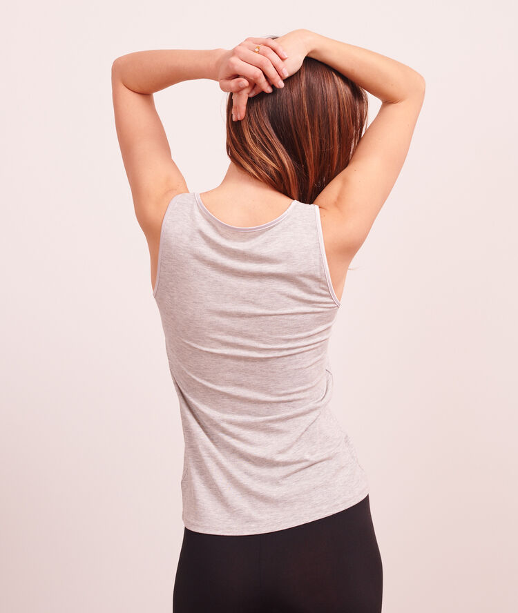 D&eacute;bardeur mailles fines gris clair.