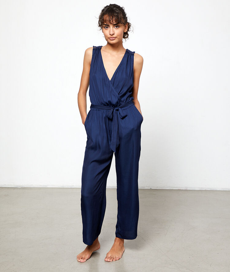 Satiny jumpsuit with a wrap style low cut blue.