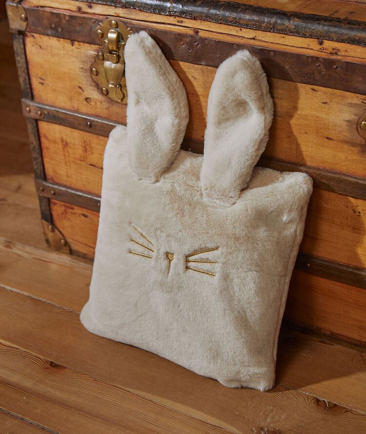 Plaid avec housse lapin rose.