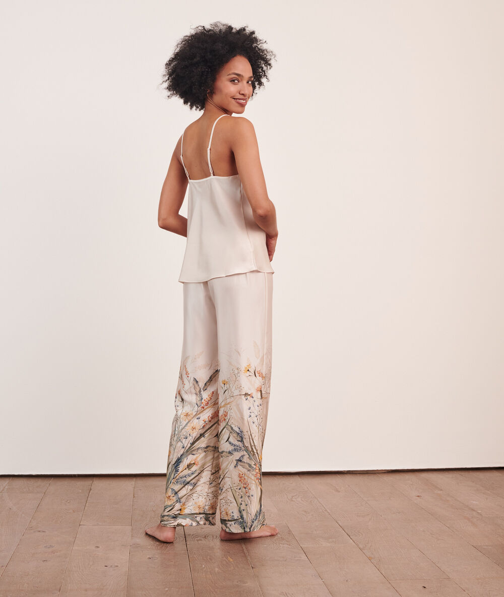 Lace trimmed cami top off white.