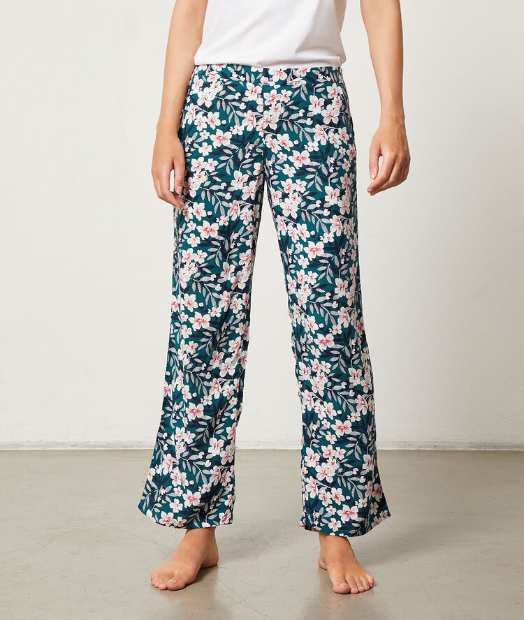 Pantalon imprim&eacute; floral vert.