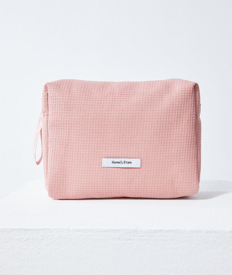 Trousse nid d'abeille rose.