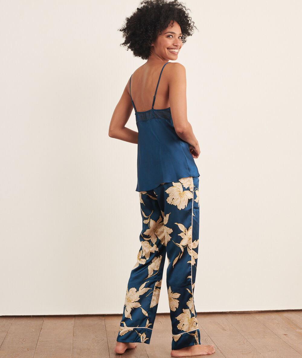 Satiny cami top with a lace trimmed low cut blue petroleum.