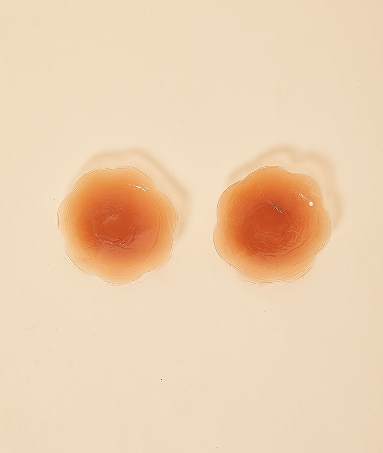 Nipple covers bronze.