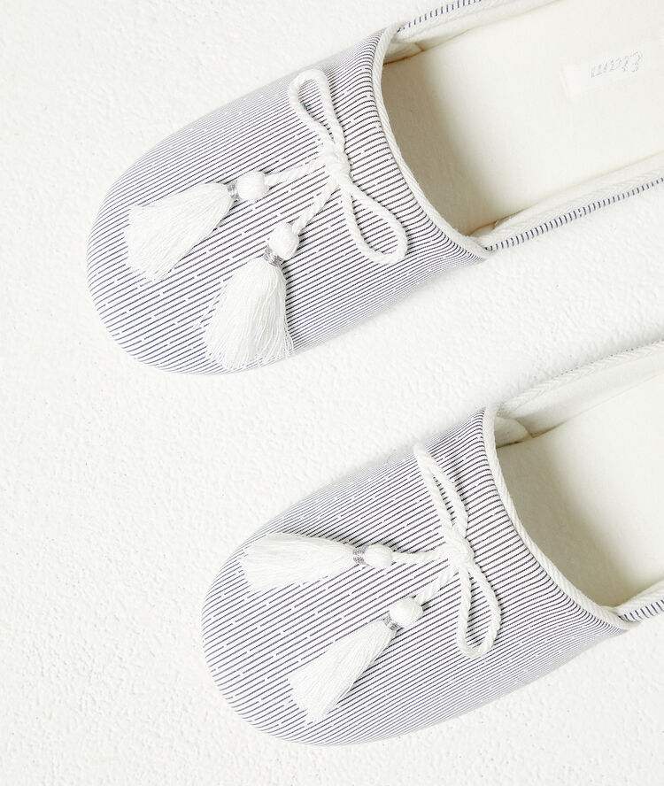 Chaussons mules turquoise.