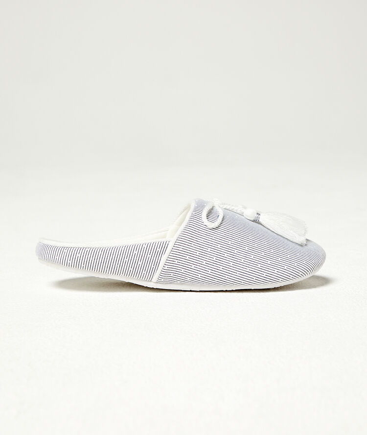 Chaussons mules turquoise.