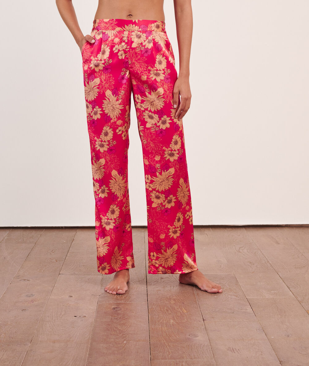 Satiny trousers in print bright-red.
