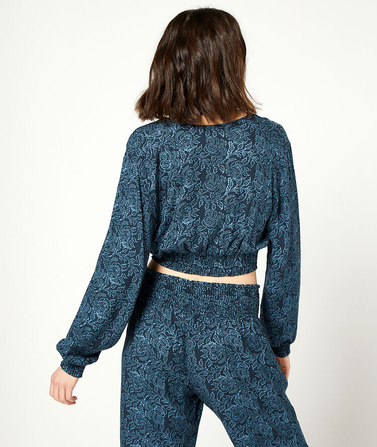 Smocked top in a floral print navy blue.