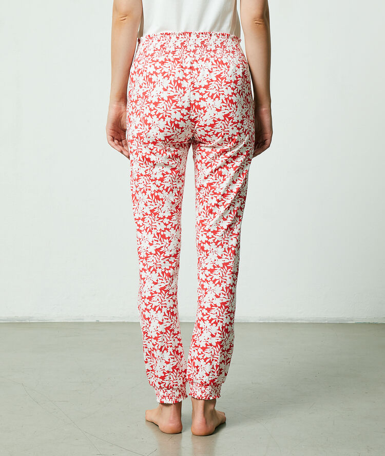Pantalon imprim&eacute; floral corail.