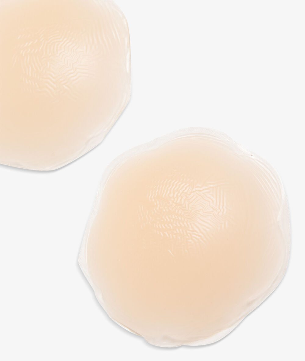 Nipple covers skin.