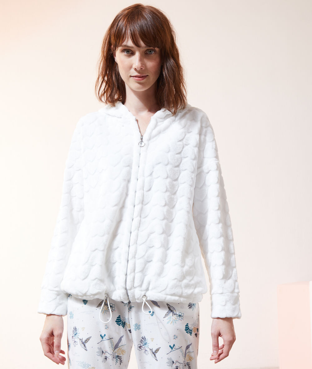 Fleece cardigan in a heart print off white.