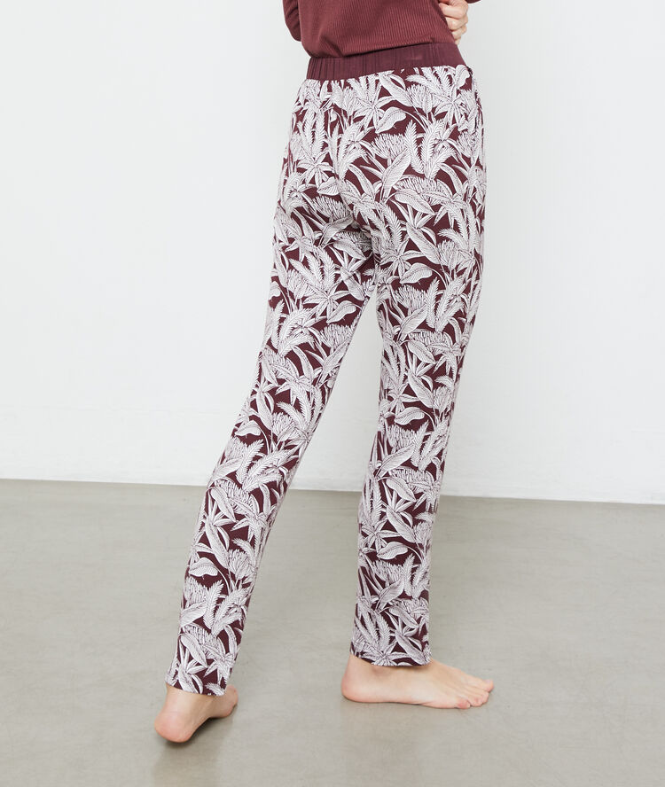 Foliage print trousers brown.