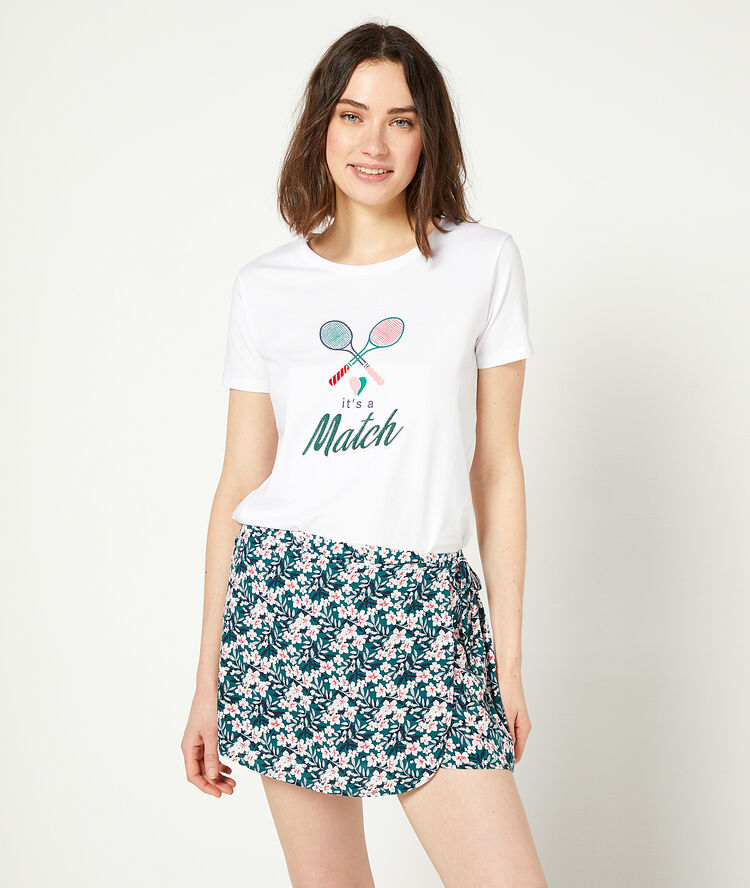 Wrap shorts in a floral print green.