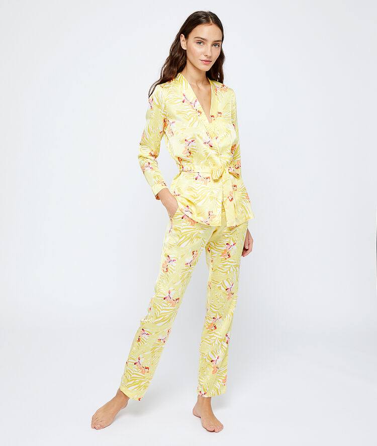 Satiny trousers in a floral print off white.