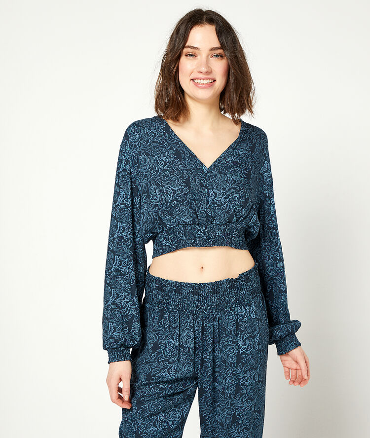 Smocked top in a floral print navy blue.