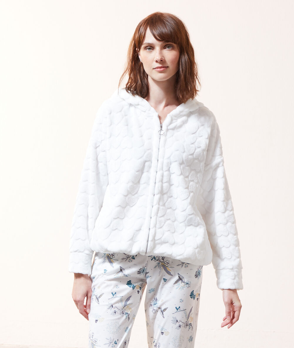 Fleece cardigan in a heart print off white.
