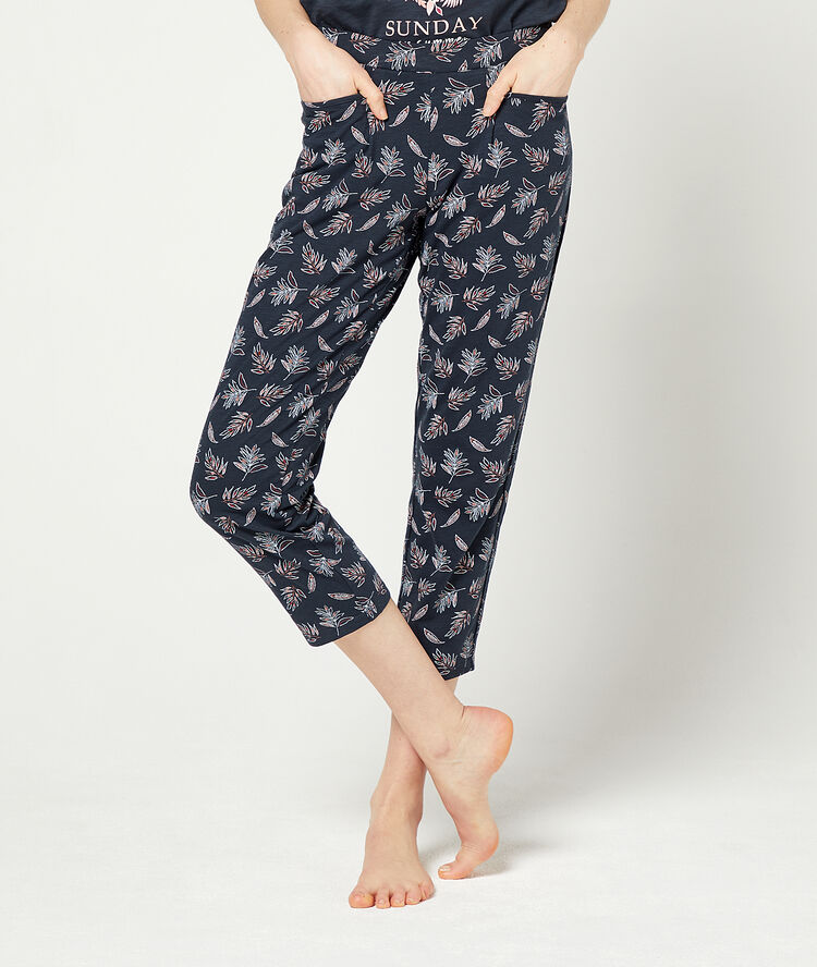 Crop trousers in a foliage print  navy blue.