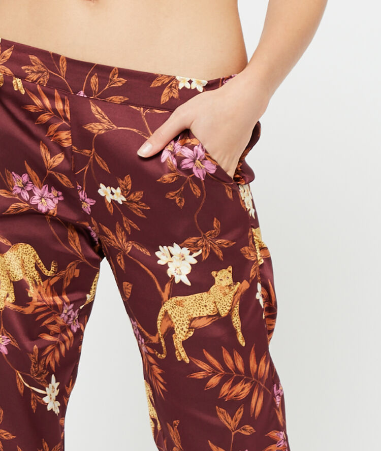 Leopard print trousers burgundy.