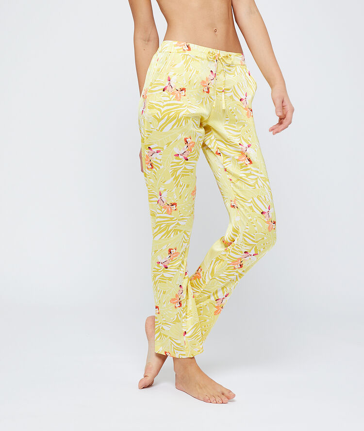 Satiny trousers in a floral print off white.