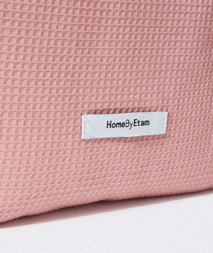 Trousse nid d'abeille rose.