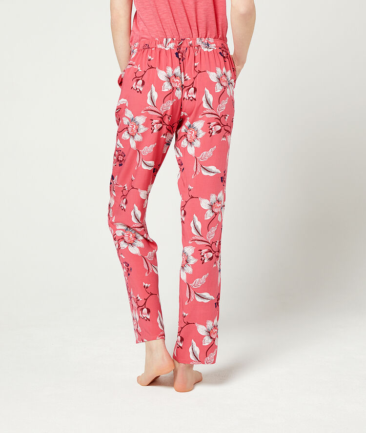 Trousers in a floral print coral.