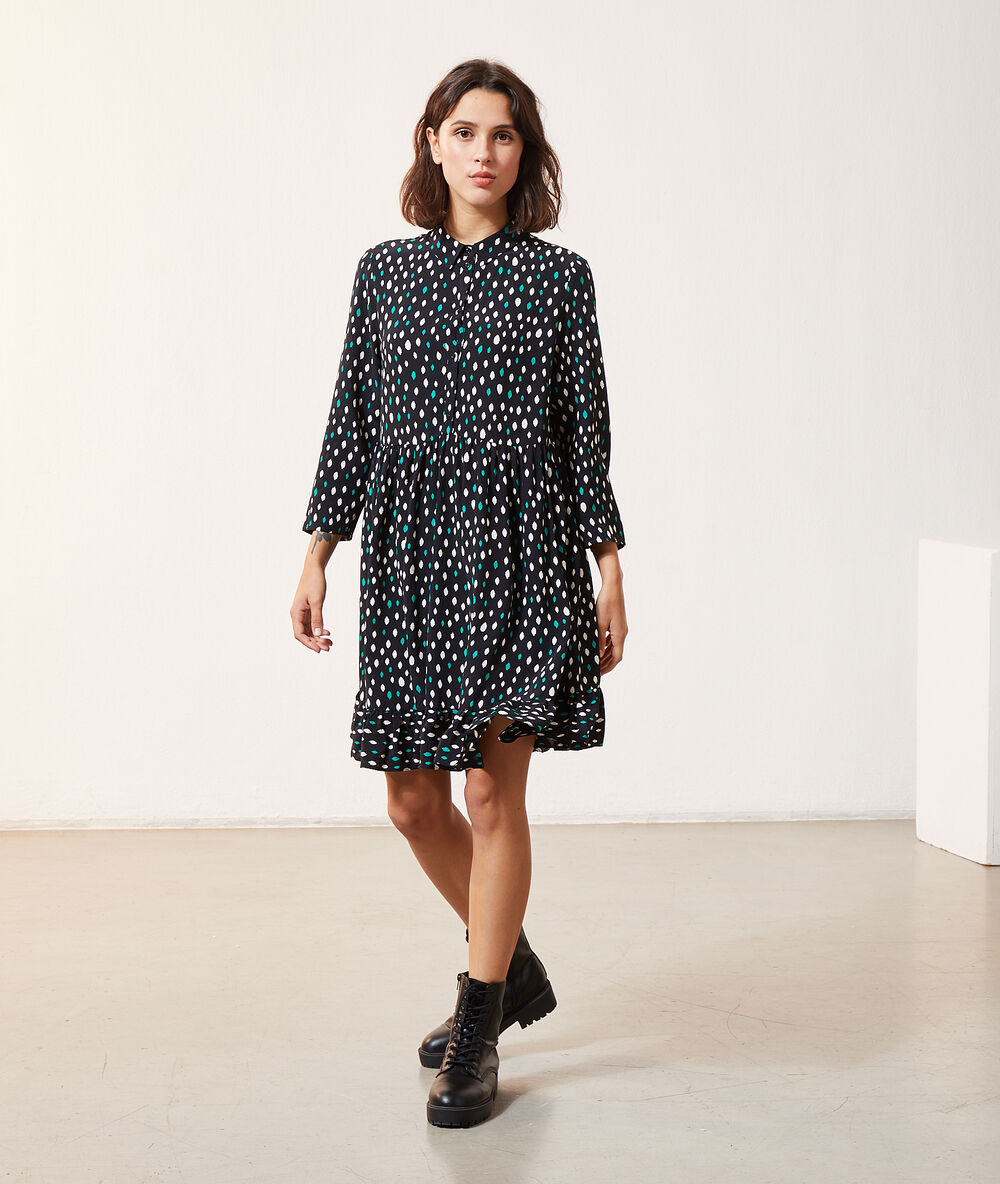 Button through dress in print black.