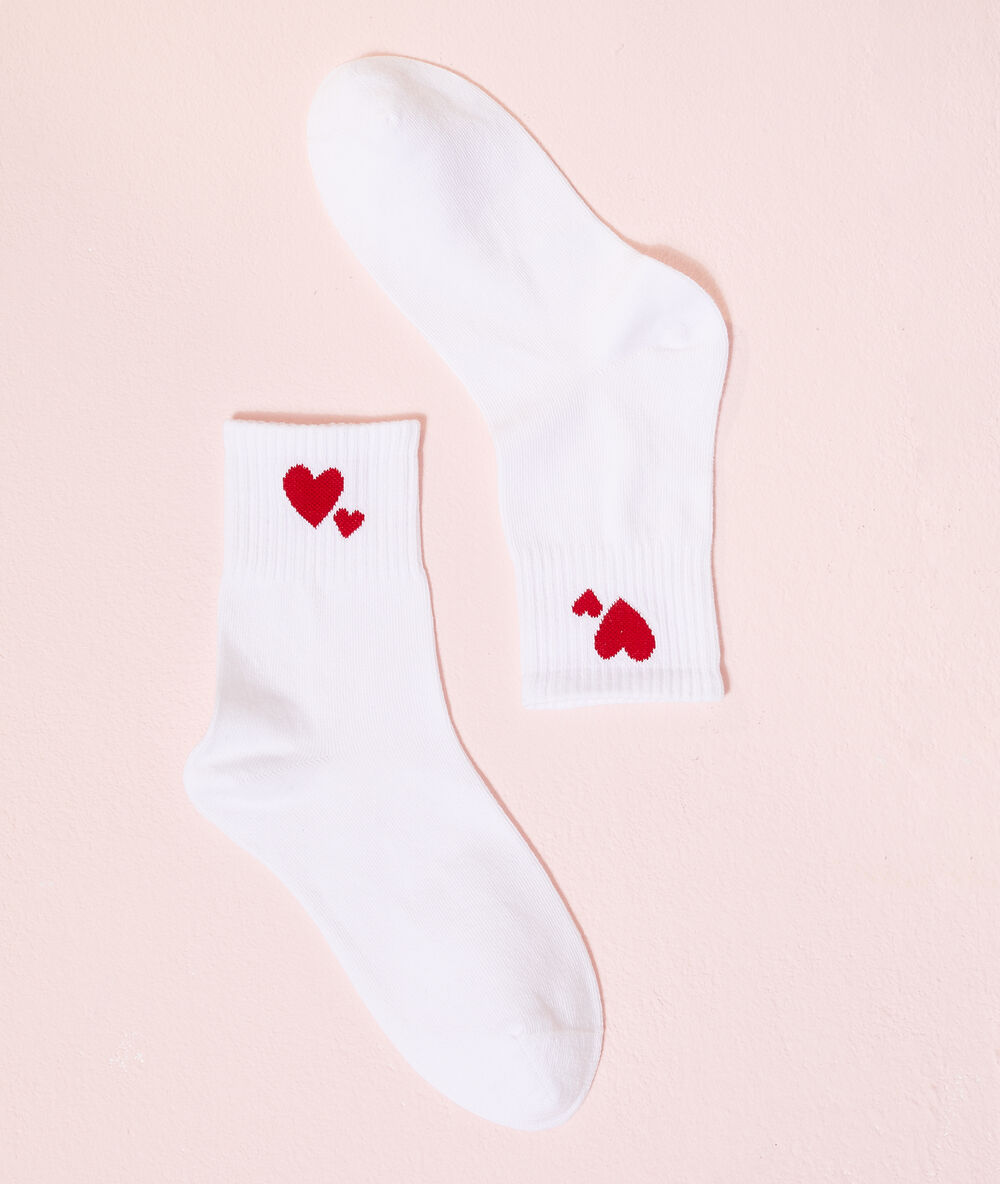 Chaussettes c&oelig;urs blanc.