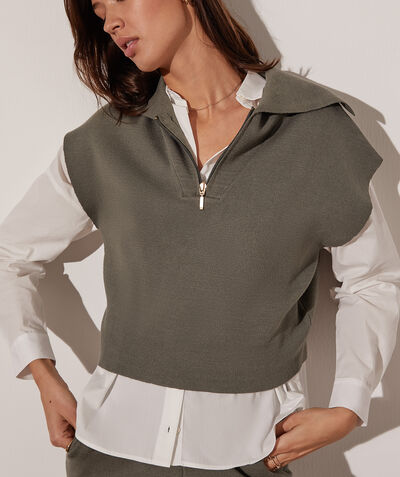 Sleeveless sweater with zip neck