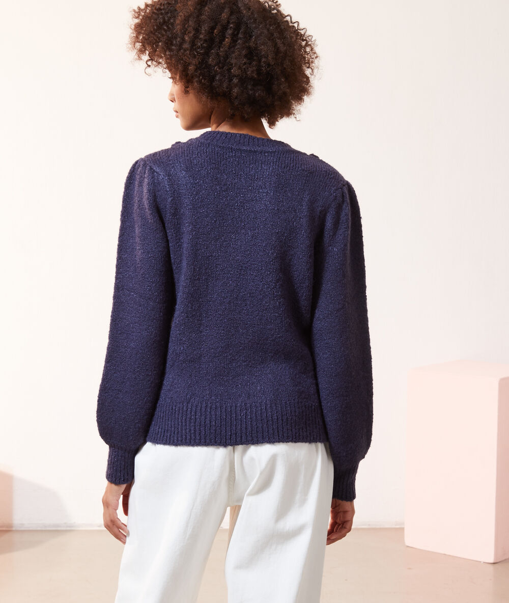 Pull torsad&eacute; manches ballon bleu marine.