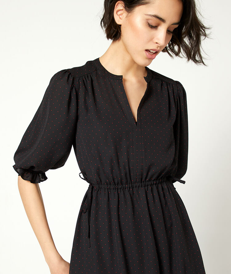 Vestido calado de lunares negro.