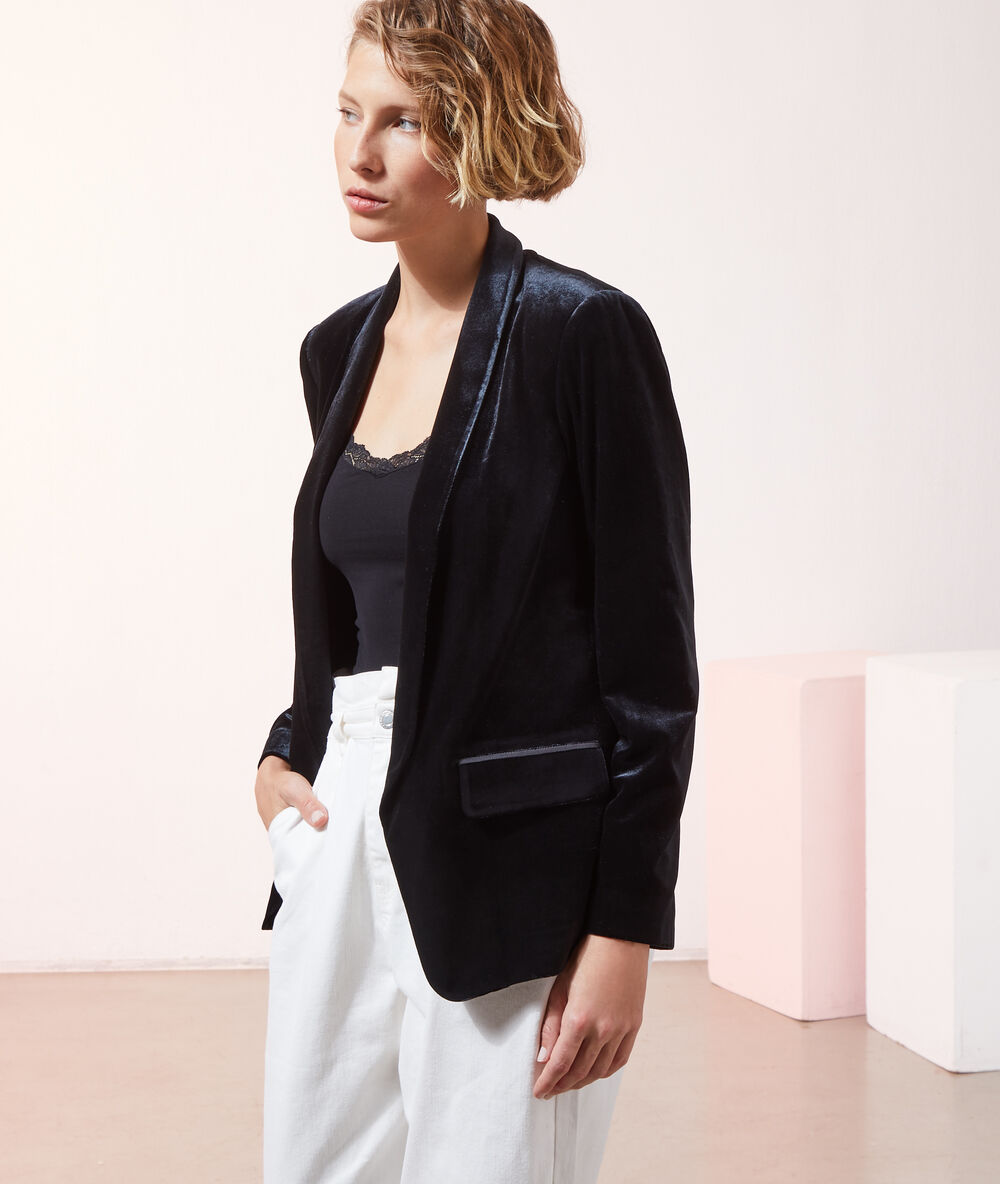 Veste de tailleur en velours noir.