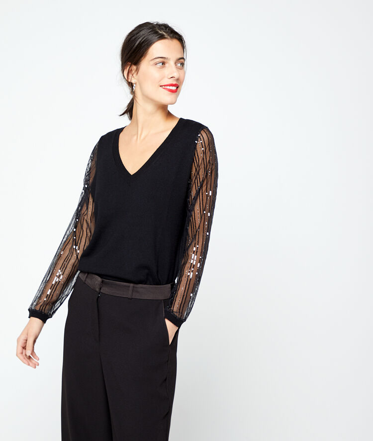 Pull à détails sequins et manches transparentes noir.