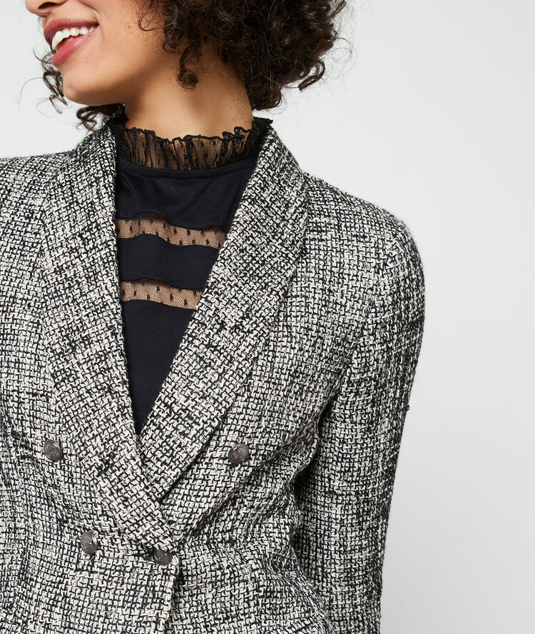 Suit jacket in a tweed look black.