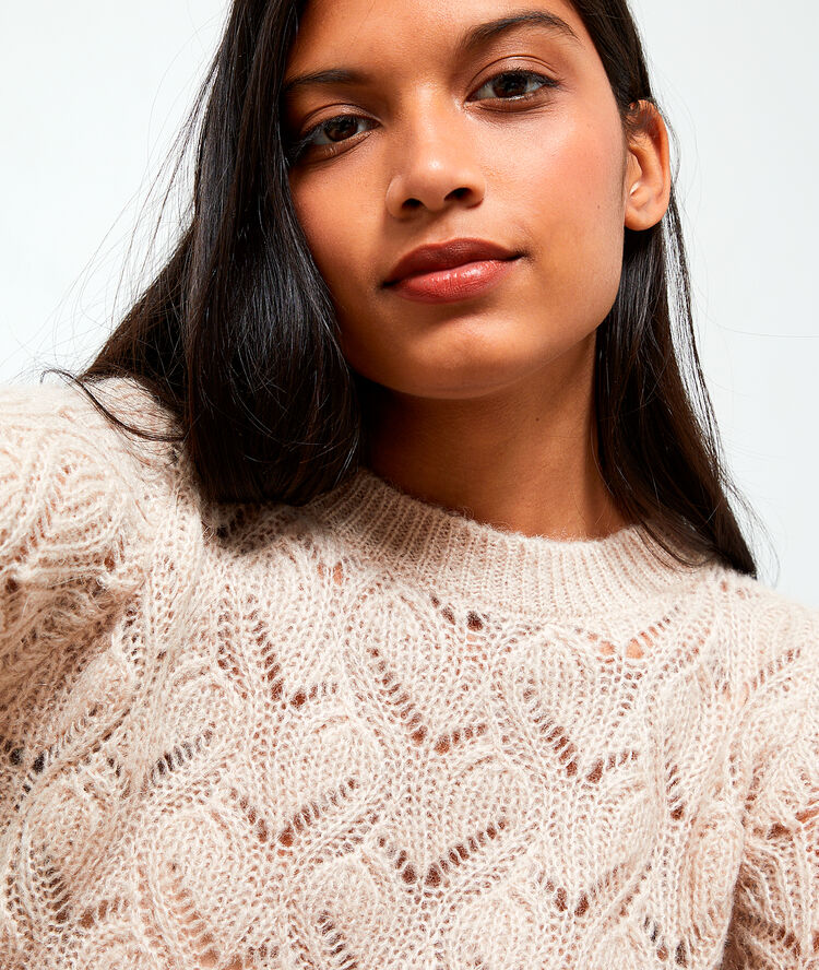 Pull italien en maille pointelle poudre.