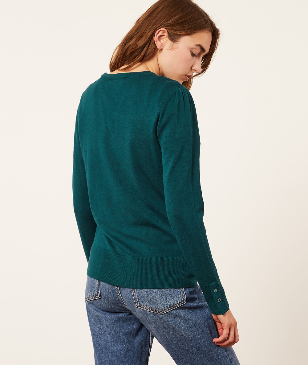 Crew neck jumper in a fine knit peacock green.
