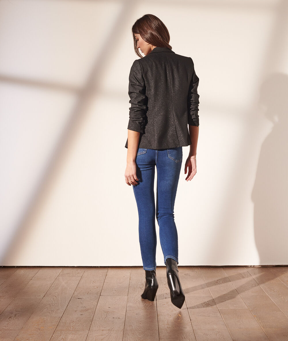 Veste de tailleur paillet&eacute;e noir.