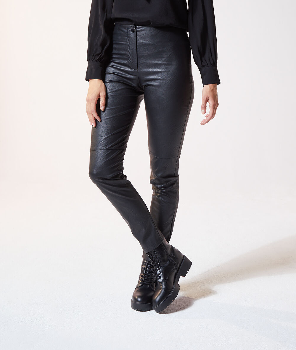 Trousers in a leather look black.