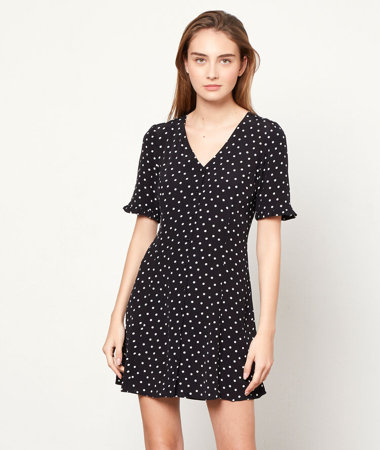 Robe boutonn&eacute;e &agrave; pois noir.