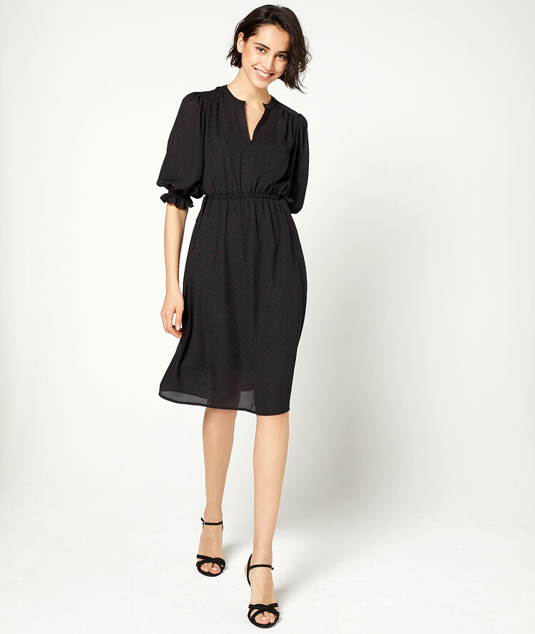 Vestido calado de lunares negro.