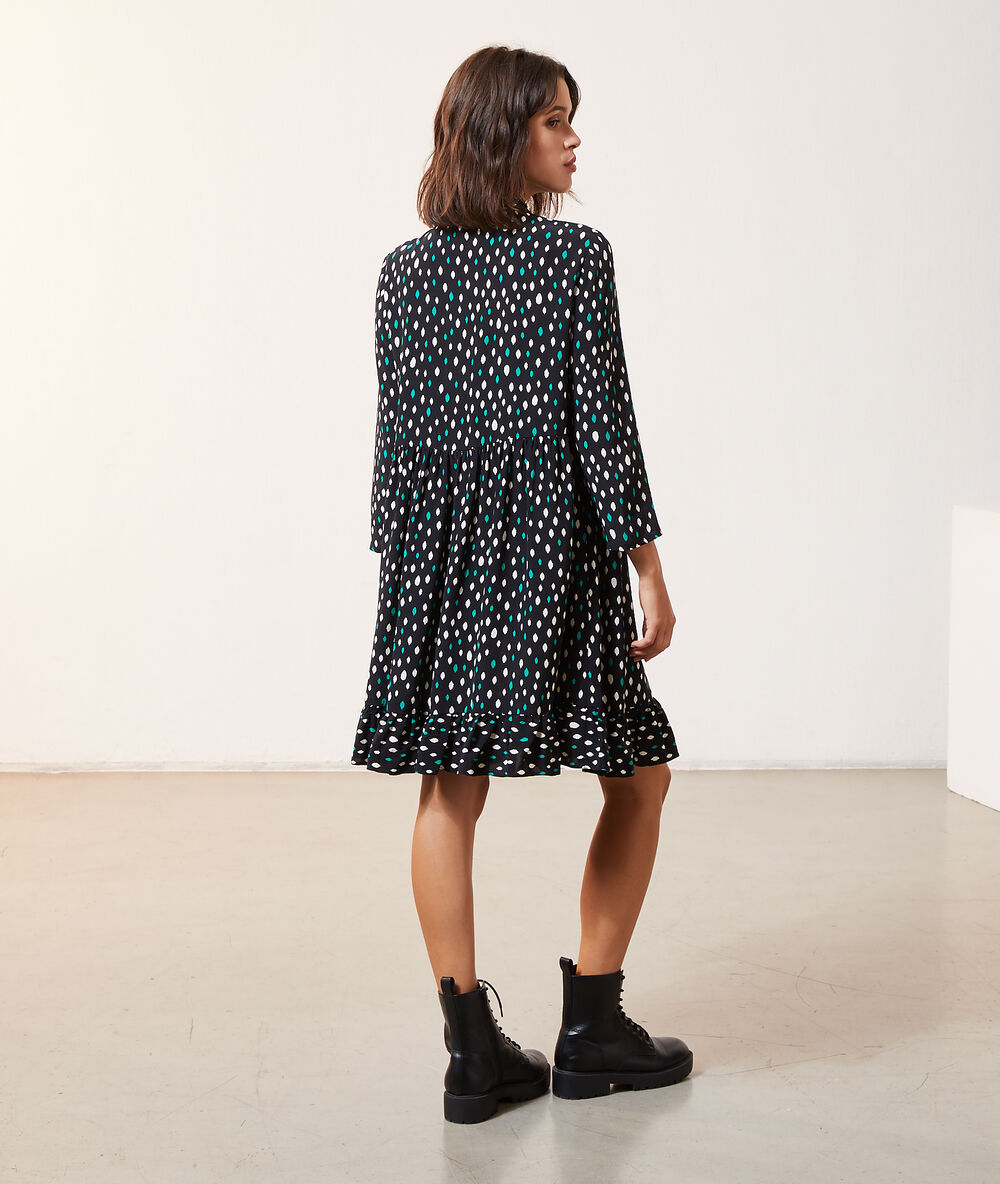 Button through dress in print black.