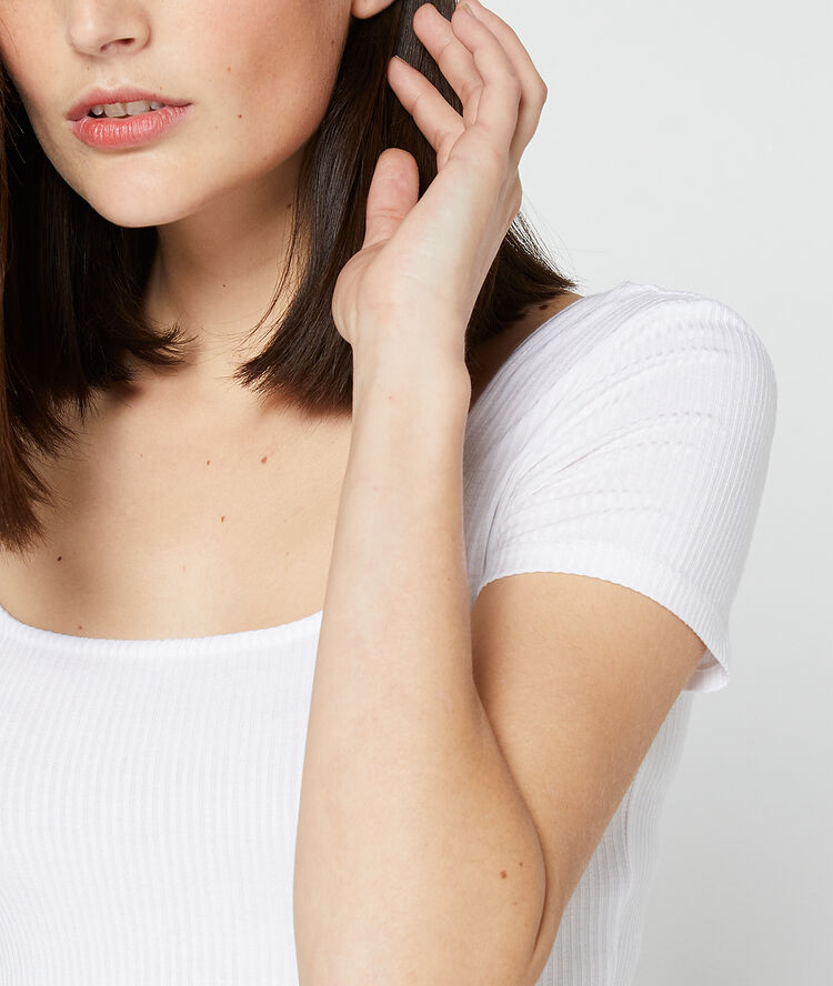 Ribbed top with low cut back white.