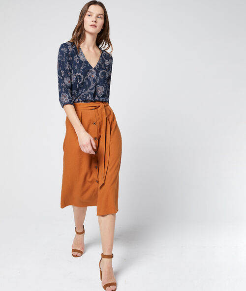 Top in print with metallic threads marine.